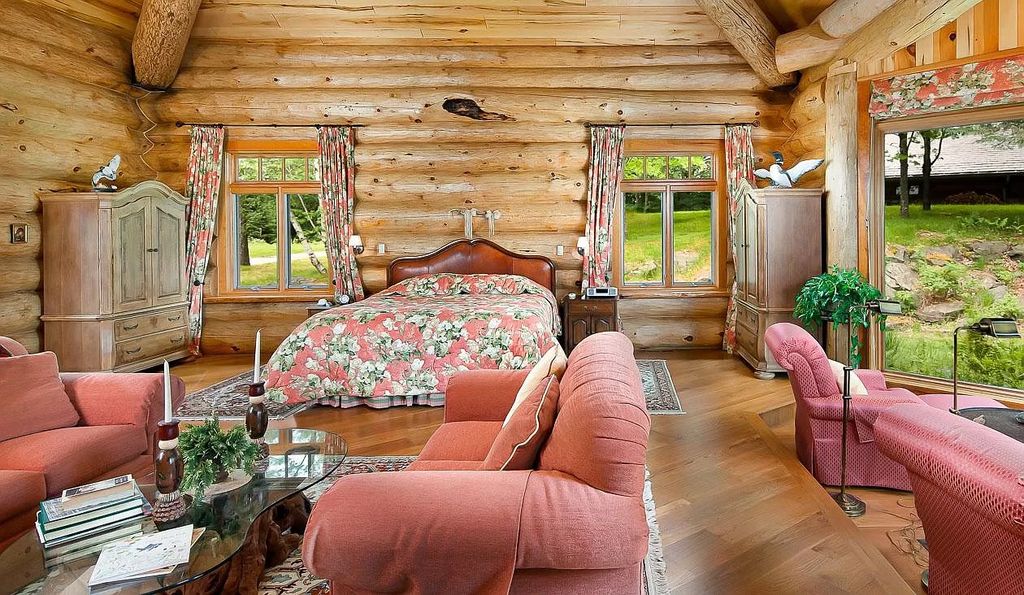 Can you picture yourself snoozing in this bedroom? With hardwood interiors and traditional furniture, everything looks like it belongs in a fairy tale.