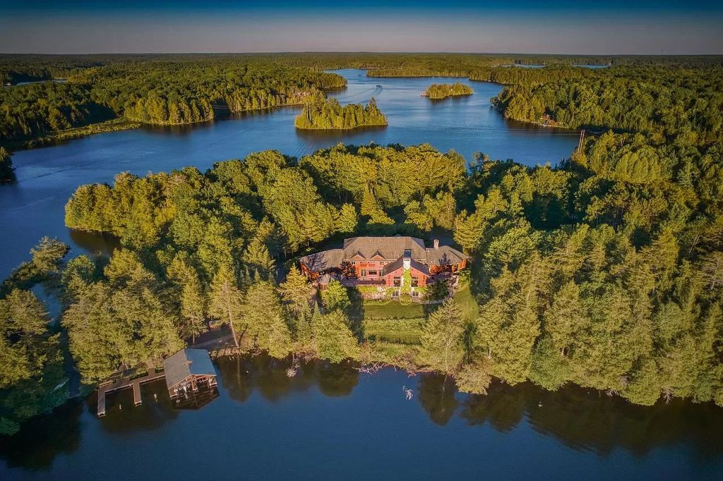 The Estate in Watersmeet is a luxurious home commanding panoramic lake views from all points now available for sale. This home located at 19210 Mamie Lake Rd W, Watersmeet, Michigan; offering 07 bedrooms and 07 bathrooms with 10,004 square feet of living spaces.