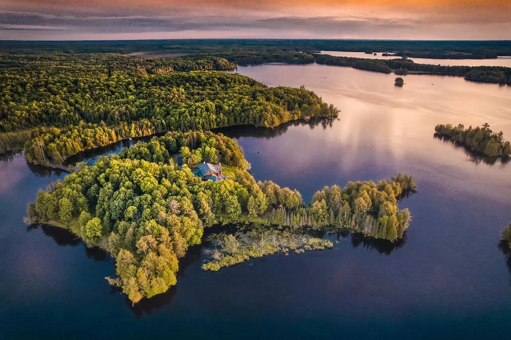 The Estate in Watersmeet is a luxurious home commanding panoramic lake views from all points now available for sale. This home located at 19210 Mamie Lake Rd W, Watersmeet, Michigan; offering 07 bedrooms and 07 bathrooms with 10,004 square feet of living spaces. 