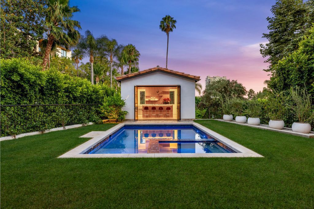 The House is Hollywood Hills, a spectacular Italian inspired villa with natural light flowing through the large windows and doors, enjoy views of the city, pool, and verdant landscaping is now available for sale. This home located at 9165 Cordell Dr, Los Angeles, California