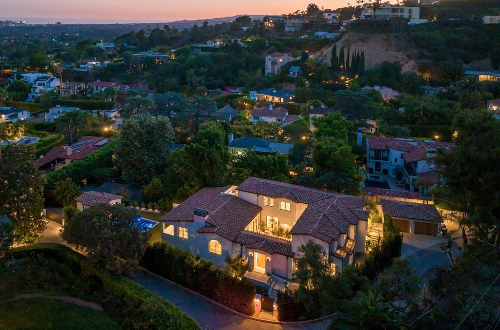 The House is Hollywood Hills, a spectacular Italian inspired villa with natural light flowing through the large windows and doors, enjoy views of the city, pool, and verdant landscaping is now available for sale. This home located at 9165 Cordell Dr, Los Angeles, California