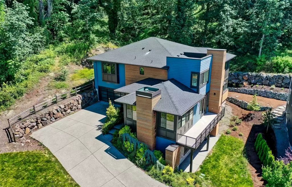 The Estate in Bothell is a luxurious home sitting on a spacious, secluded lot now available for sale. This home located at 10028 NE 162nd St, Bothell, Washington; offering 05 bedrooms and 04 bathrooms with 4,390 square feet of living spaces. 