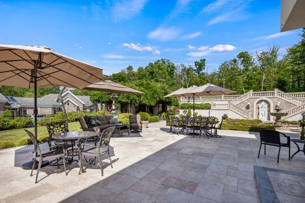 The Home in New Jersey is a luxury French Manor with sumptuous interiors, and park-like settings, now available for sale. This home located at 100 Acorn Dr, Watchung Boro, New Jersey