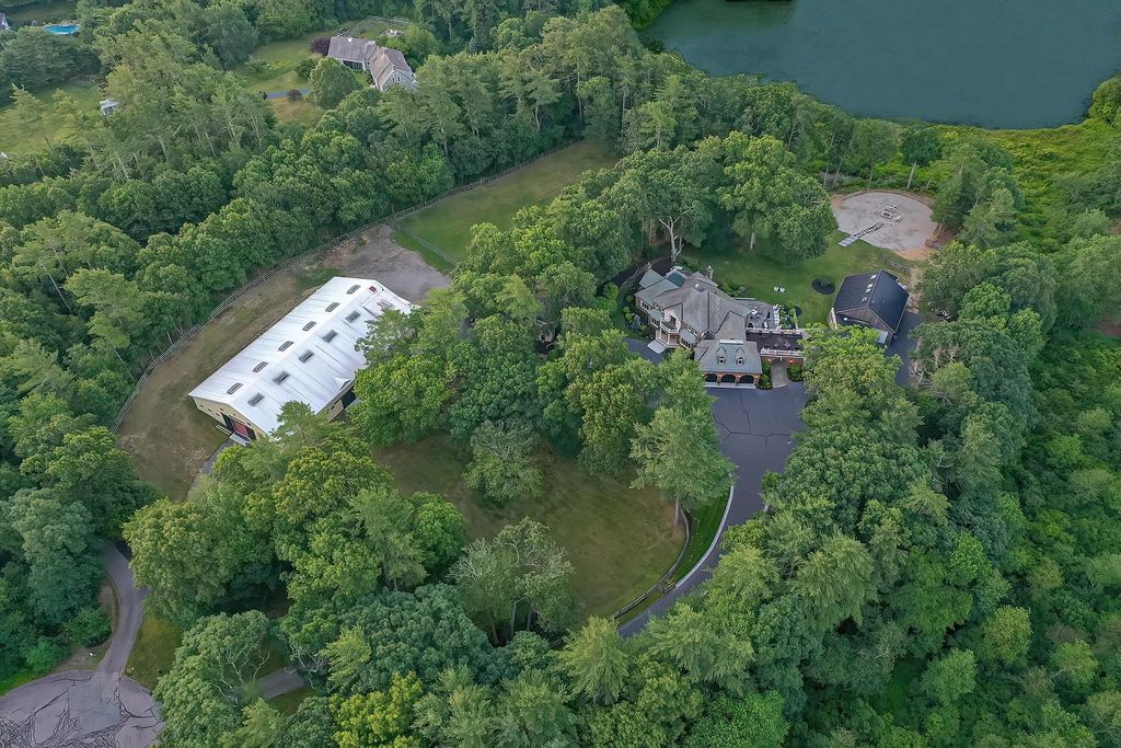 The Estate in Kingston is a stunning private equestrian estate with endless possibilities, now available for sale. This home located at 31 Ortolani Circle, Kingston, Massachusetts