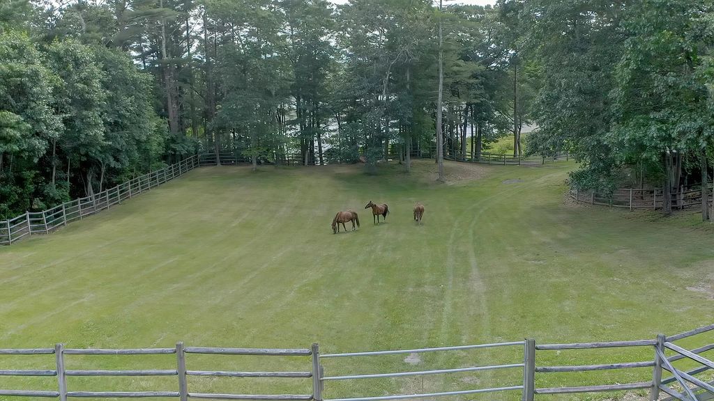 The Estate in Kingston is a stunning private equestrian estate with endless possibilities, now available for sale. This home located at 31 Ortolani Circle, Kingston, Massachusetts