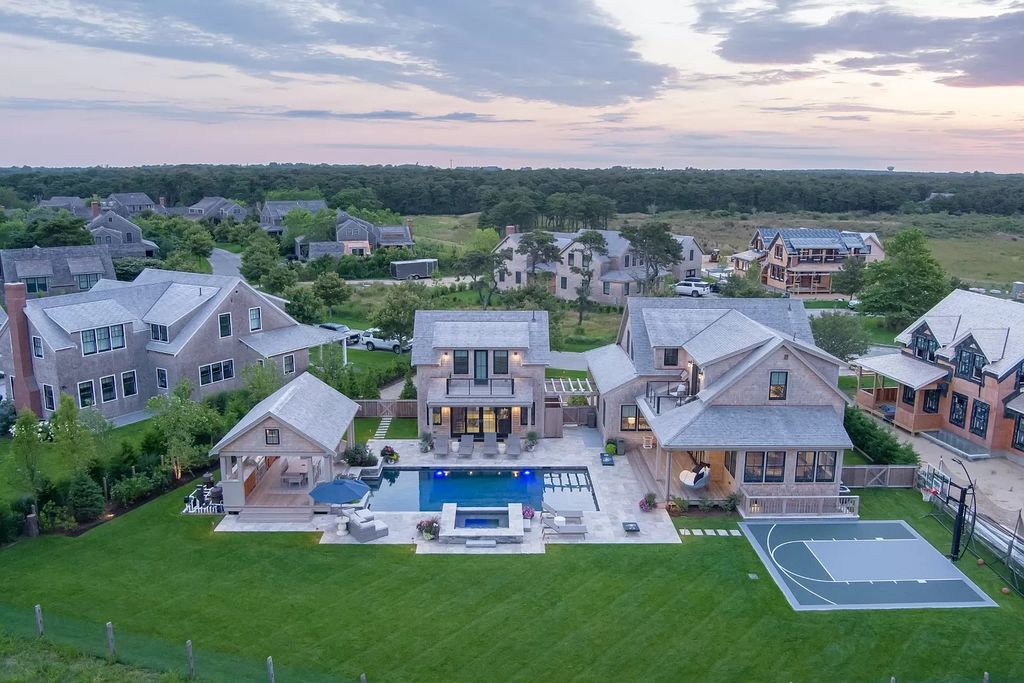 The Estate in Nantucket is a luxurious home thoughtfully designed to incorporate all the bells and whistles in a tasteful and elegant fashion now available for sale. This home located at 21 Ellens Way, Nantucket, Massachusetts; offering 05 bedrooms and 06 bathrooms with 6,200 square feet of living spaces.
