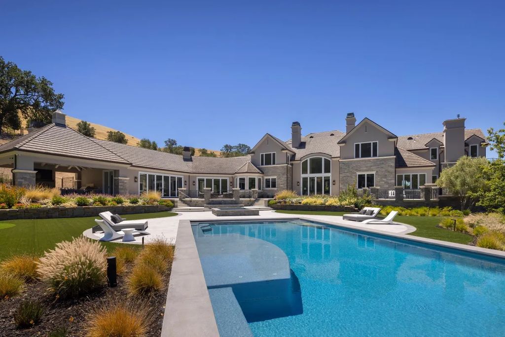 The Home in Danville, an extraordinarily chic and sophisticated residence with a backdrop of Mt. Diablo Gated, fully landscaped lot of approximately 4.9 acres is now available for sale. This home located at 3114 Blackhawk Meadow Ln, Danville, Los Angeles, California