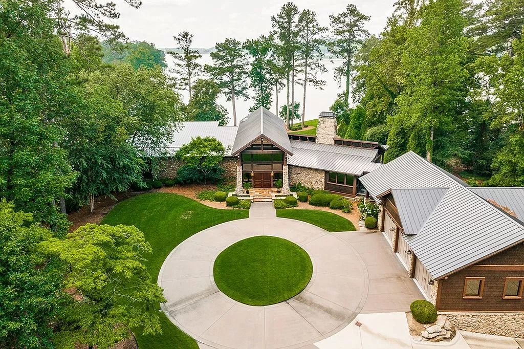 The Home in Columbus is a luxurious home with spectacular water views from almost every room, now available for sale. This home located at 6045 Round Hill Ct, Columbus, Georgia