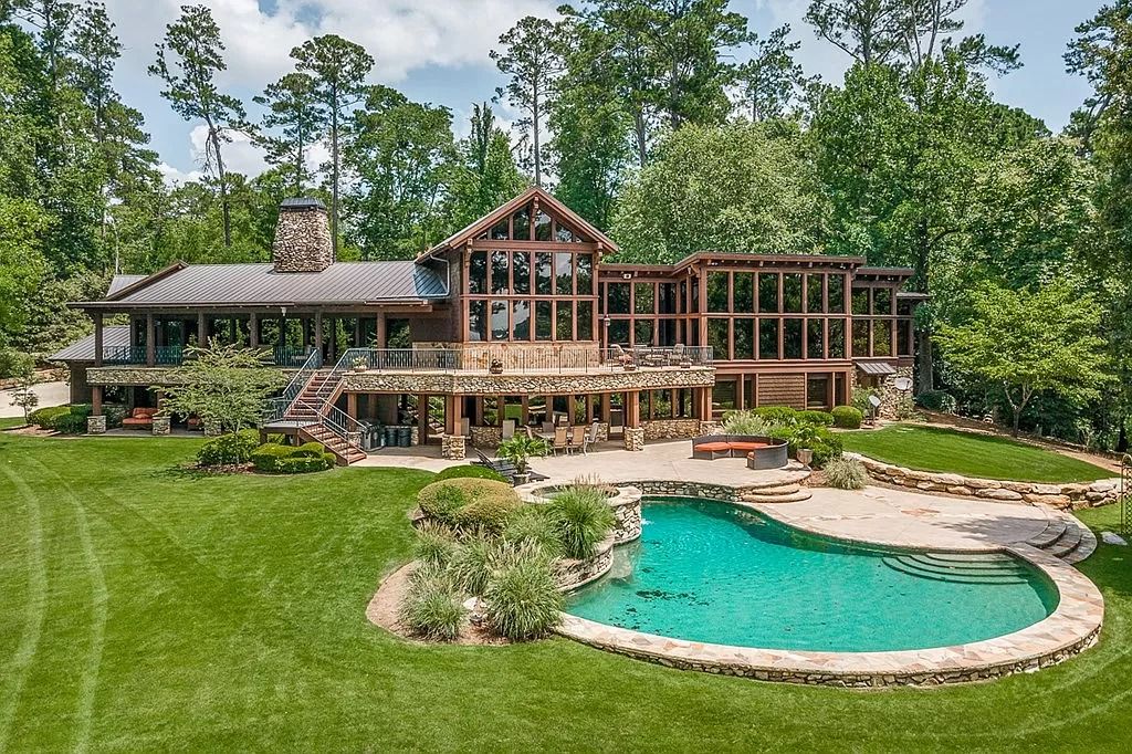 The Home in Columbus is a luxurious home with spectacular water views from almost every room, now available for sale. This home located at 6045 Round Hill Ct, Columbus, Georgia