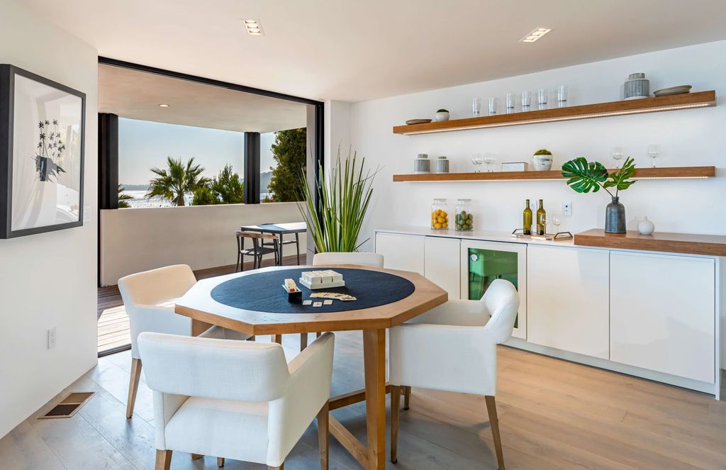 The Home in Malibu, a divine modern retreat with open-plan living spaces and entertainment-ready outdoor space offering far-reaching ocean views plus seamless access to local conveniences is now available for sale. This home located at 25225 Malibu Rd, Malibu, California