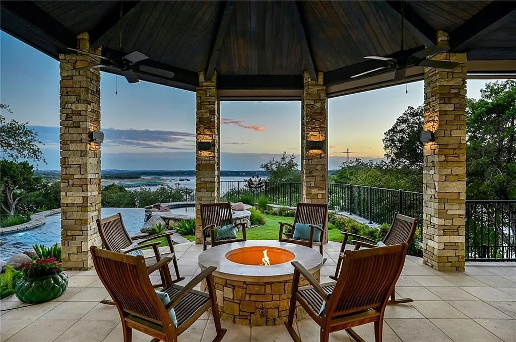 The Estate in Jonestown, a majestic home on the shores of Lake Travis with the home sited on a gradual slope to the water with a walkable stone path, the views are breathtaking in every direction is now available for sale. This home located at 17703 Breakwater Dr, Jonestown, Texas 
