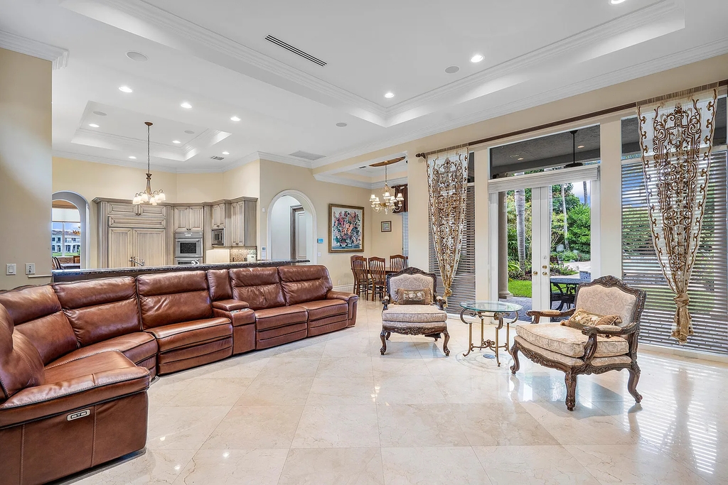 The Home in Boca Raton, a palatial oasis features elegant appointments throughout and was designed by award winning Architect Randall Stofft and custom built by Charles-Watt is now available for sale. This home located at 9468 Grand Estates Way, Boca Raton, Florida