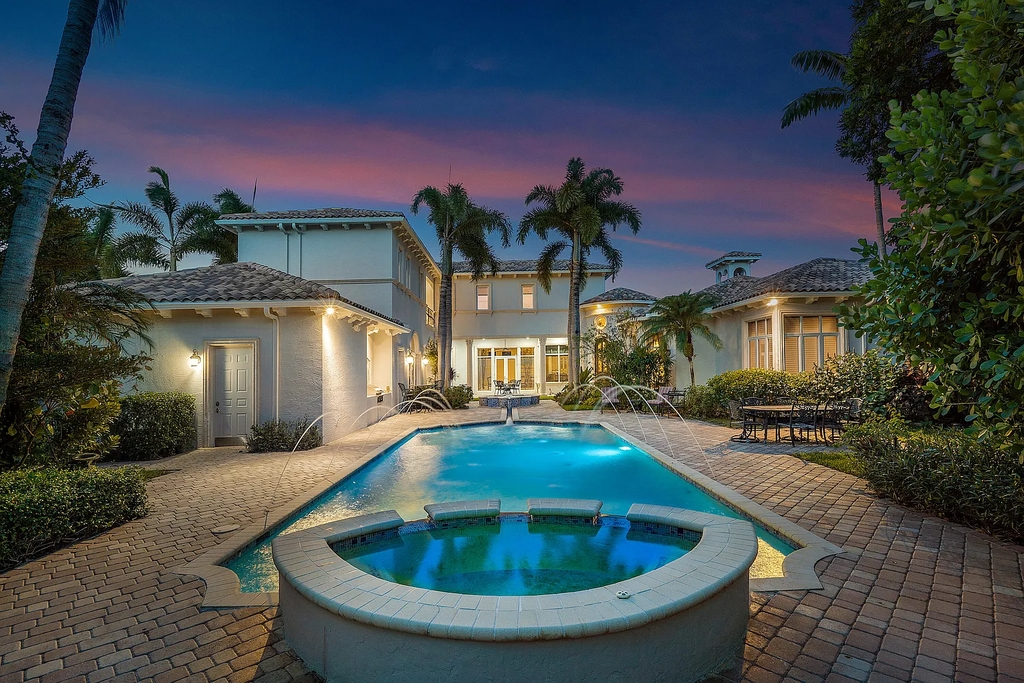 The Home in Boca Raton, a palatial oasis features elegant appointments throughout and was designed by award winning Architect Randall Stofft and custom built by Charles-Watt is now available for sale. This home located at 9468 Grand Estates Way, Boca Raton, Florida
