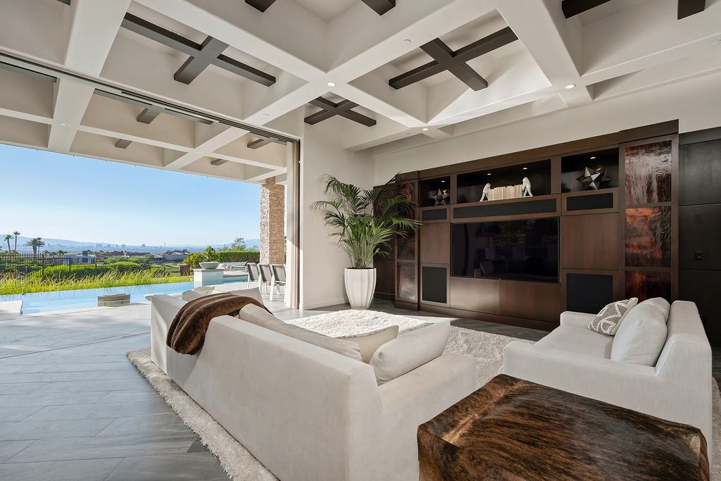 The Home in Henderson, a recently refurbished property has sleek, modern finishes and features a spectacular floating staircase, mountains and golf course views is now available for sale. This home located at 633 Saint Croix St, Henderson, Nevada