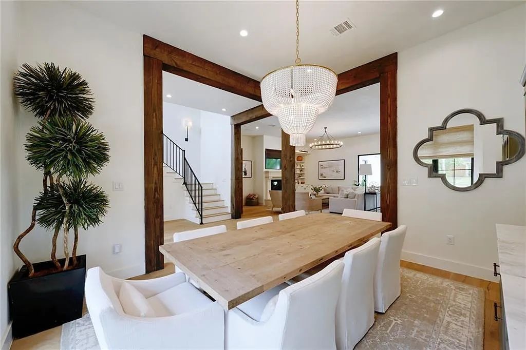 The Farmhouse in Austin, a luxurious home in the Lost Creek neighborhood of West Lake Hills featuring 10' and 11' ceilings throughout, a dedicated gym, half bath, and oversized laundry room adjacent to the kitchen is now available for sale. This home located at 6502 Huckleberry Cv, Austin, Texas