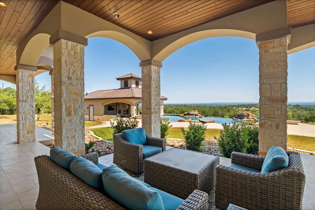 The Estate in Boerne, a one of a kind family compound with rolling hills, a stocked pond, and incredible hilltop views offers impressive entertainment amenities including resort style pool, outdoor kitchen, separate 4 car work shop, gun safe room and more is now available for sale. This home located at 186 Joe Klar Rd, Boerne, Texas