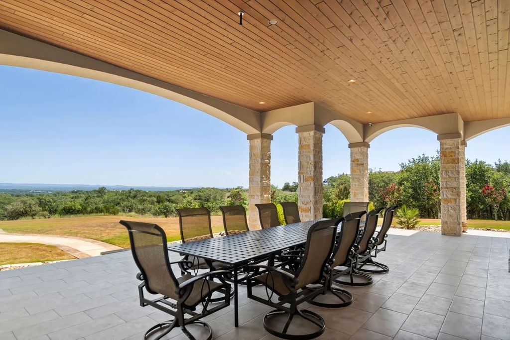 The Estate in Boerne, a one of a kind family compound with rolling hills, a stocked pond, and incredible hilltop views offers impressive entertainment amenities including resort style pool, outdoor kitchen, separate 4 car work shop, gun safe room and more is now available for sale. This home located at 186 Joe Klar Rd, Boerne, Texas