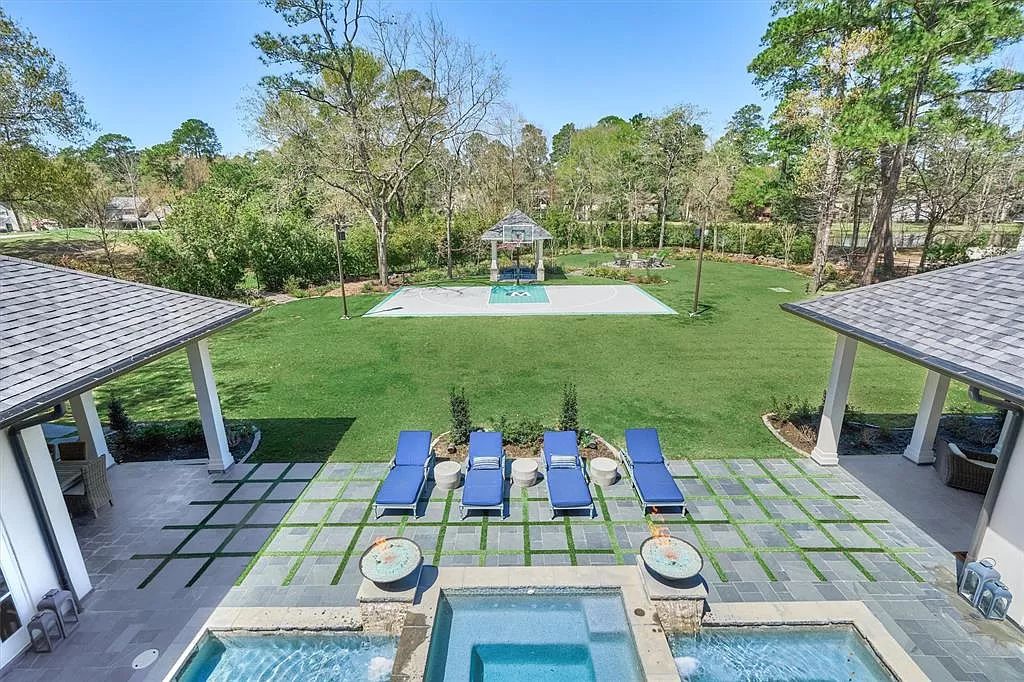 The Home in The Woodlands built for discerning clientele with the finest materials and upmost privacy for entertaining is now available for sale. This home located at 25 S Doe Run Dr, The Woodlands, Texas