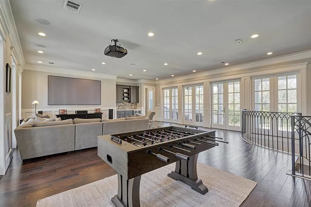 The Home in The Woodlands built for discerning clientele with the finest materials and upmost privacy for entertaining is now available for sale. This home located at 25 S Doe Run Dr, The Woodlands, Texas