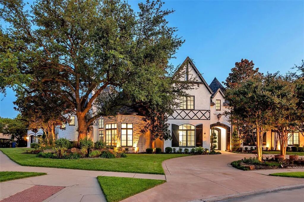 The Home in Frisco, an extraordinary modified Tudor style custom estate offers multiple spaces for entertaining and luxury amenities including onsite splash pad, pool and spa, two story terrace with balcony, theater room, game room, wine cellar and more is now available for sale. This home located at 6267 Sweeney Trl, Frisco, Texas
