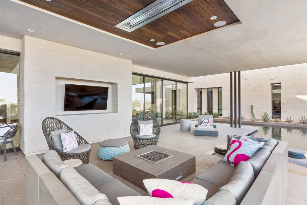 The Home in Henderson, an impressive modern estate with multiple entertaining spaces offering views of the surrounding mountains and serene desertscape is now available for sale. This home located at 1595 Villa Rica Dr, Henderson, Nevada