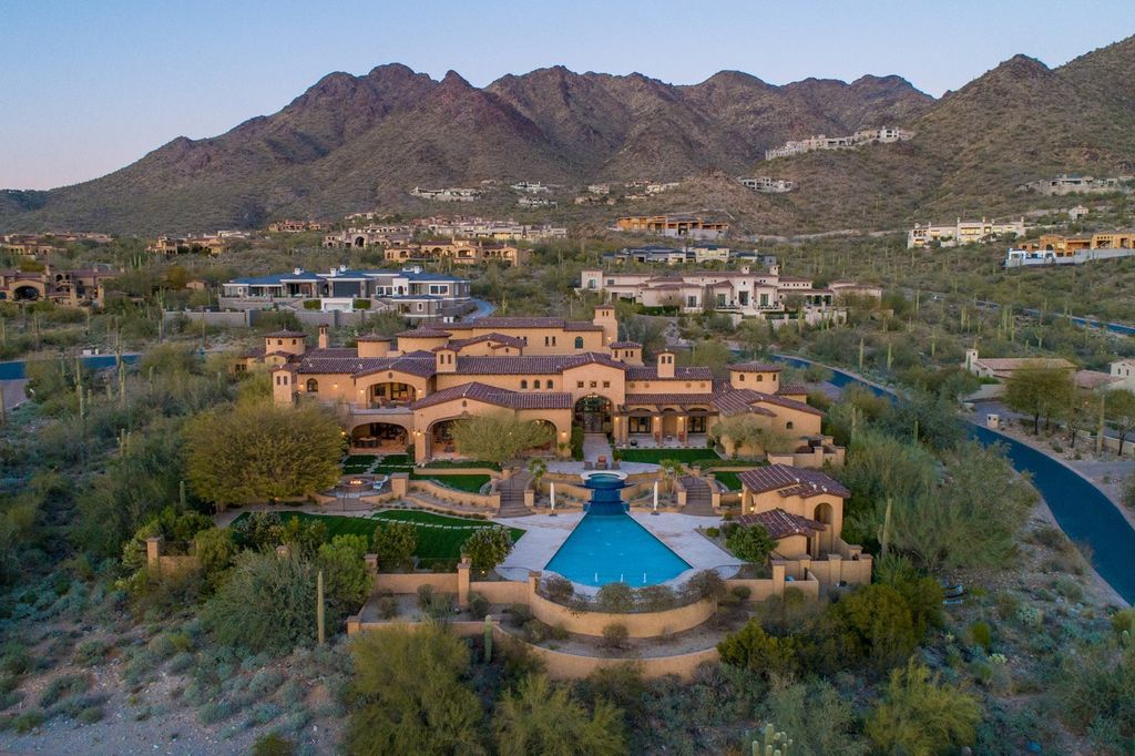 The Mansion in Scottsdale, a luxurious and gracious estate has been impeccably executed and lovingly maintained amongst the magnificent McDowell Mountains in the Upper Canyon of Silverleaf showcasing the pinnacle of extraordinary entertaining lifestyle is now available for sale. This home located at 20936 N 109th Pl, Scottsdale, Arizona