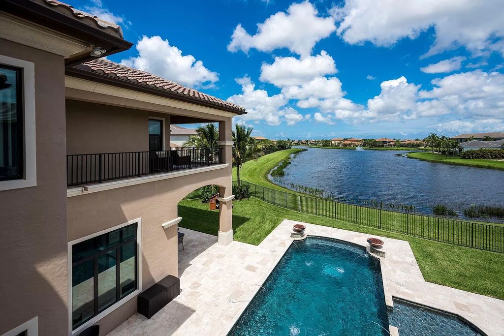 The Home in Delray Beach, a dream retreat on designer appointed over-sized wide lakefront lot overlooking the rippling water and glowing fountain is now available for sale. This home located at 16598 Fleur De Lis Way, Delray Beach, Florida offers 6 bedrooms and 8 bathrooms with nearly 8,000 square feet of living spaces.