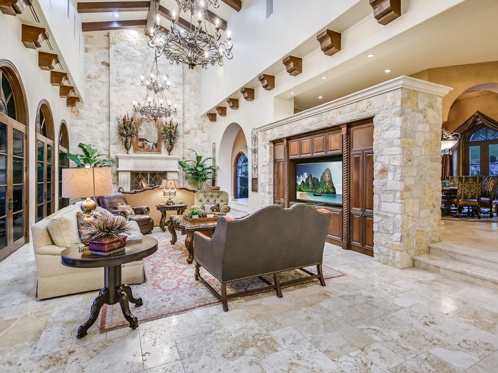 The Estate in Jonestown, a stunning estate constructed and situated at the end and hilltop area of The Peninsula on North Lake Shore Lake Travis is now available for sale. This home located at 16904 Regatta Cv, Jonestown, Texas