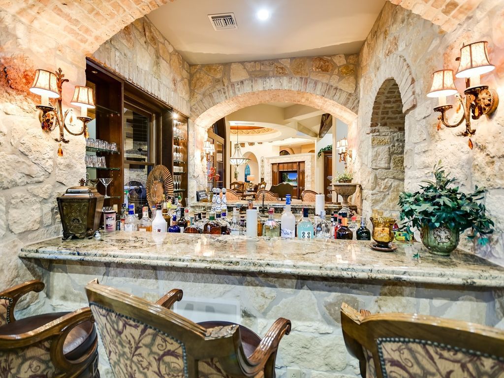 The Estate in Jonestown, a stunning estate constructed and situated at the end and hilltop area of The Peninsula on North Lake Shore Lake Travis is now available for sale. This home located at 16904 Regatta Cv, Jonestown, Texas