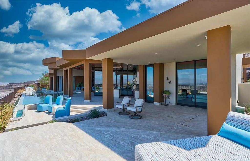 The Home in Henderson, a stunning desert contemporary masterpiece majestically perched within exclusive guard gated community of Ascaya offering breathtaking panoramic strip views is now available for sale. This home located at 9 Sky Arc Ct, Henderson, Nevada