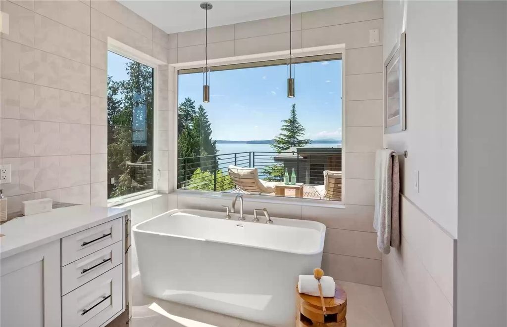 The Estate in Seattle is a luxurious home among 8 stunning homes above Beach Drive now available for sale. This home located at 5626 SW Beach Drive, Seattle, Washington; offering 05 bedrooms and 06 bathrooms with 4,674 square feet of living spaces.