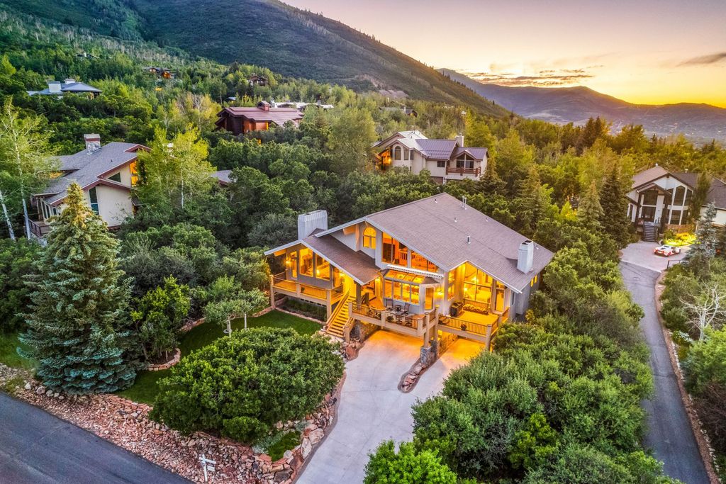 The Home in Park City, a custom and classic mountain contemporary estate surrounded by natural landscaping offering breathtaking, and expansive ski resort and Old Town views is now available for sale. This home located at 2437 Iron Canyon Dr, Park City, Utah