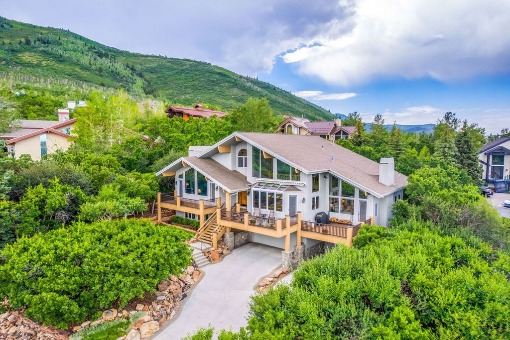 The Home in Park City, a custom and classic mountain contemporary estate surrounded by natural landscaping offering breathtaking, and expansive ski resort and Old Town views is now available for sale. This home located at 2437 Iron Canyon Dr, Park City, Utah