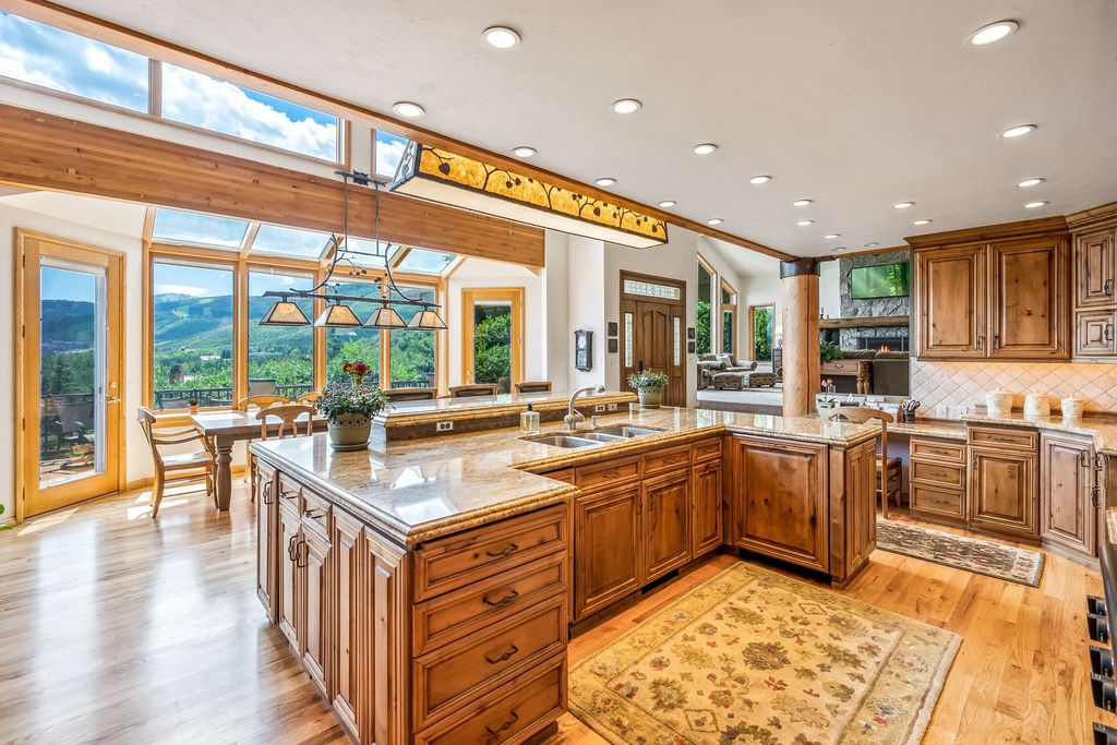 The Home in Park City, a custom and classic mountain contemporary estate surrounded by natural landscaping offering breathtaking, and expansive ski resort and Old Town views is now available for sale. This home located at 2437 Iron Canyon Dr, Park City, Utah