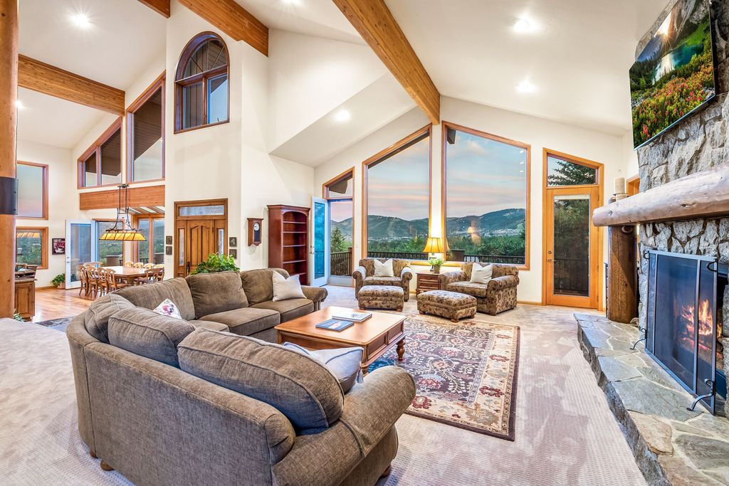 The Home in Park City, a custom and classic mountain contemporary estate surrounded by natural landscaping offering breathtaking, and expansive ski resort and Old Town views is now available for sale. This home located at 2437 Iron Canyon Dr, Park City, Utah