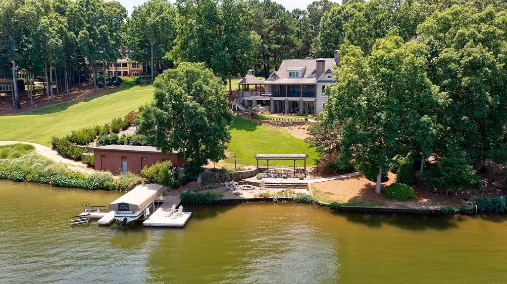 The Home in Eatonton is a luxurious home with sweeping views of Golf & Lake, now available for sale. This home located at 91 Westview Way, Eatonton, Georgia