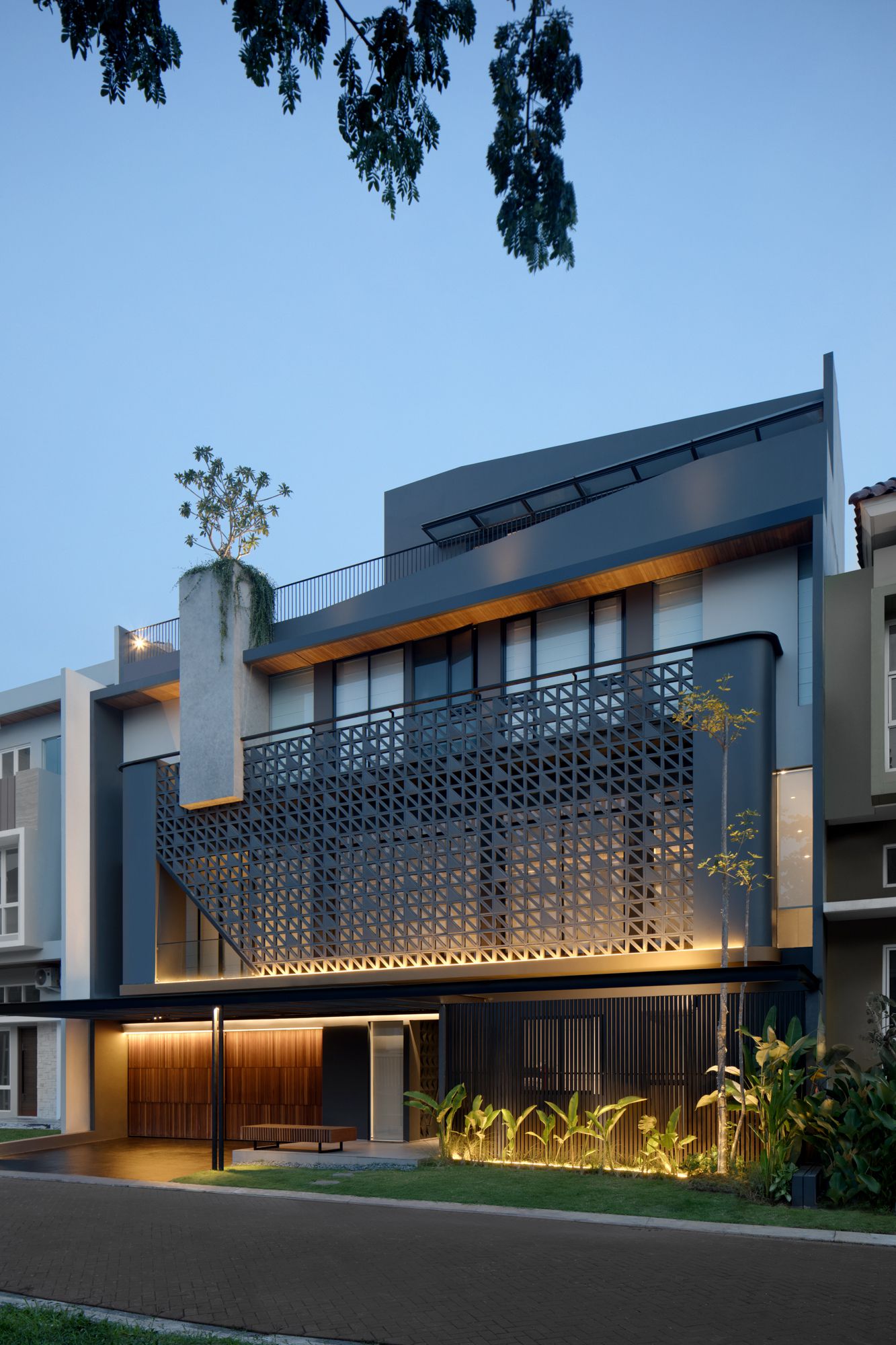 HM House, a Prominent Grey-Structured Three-storey by Axial Studio