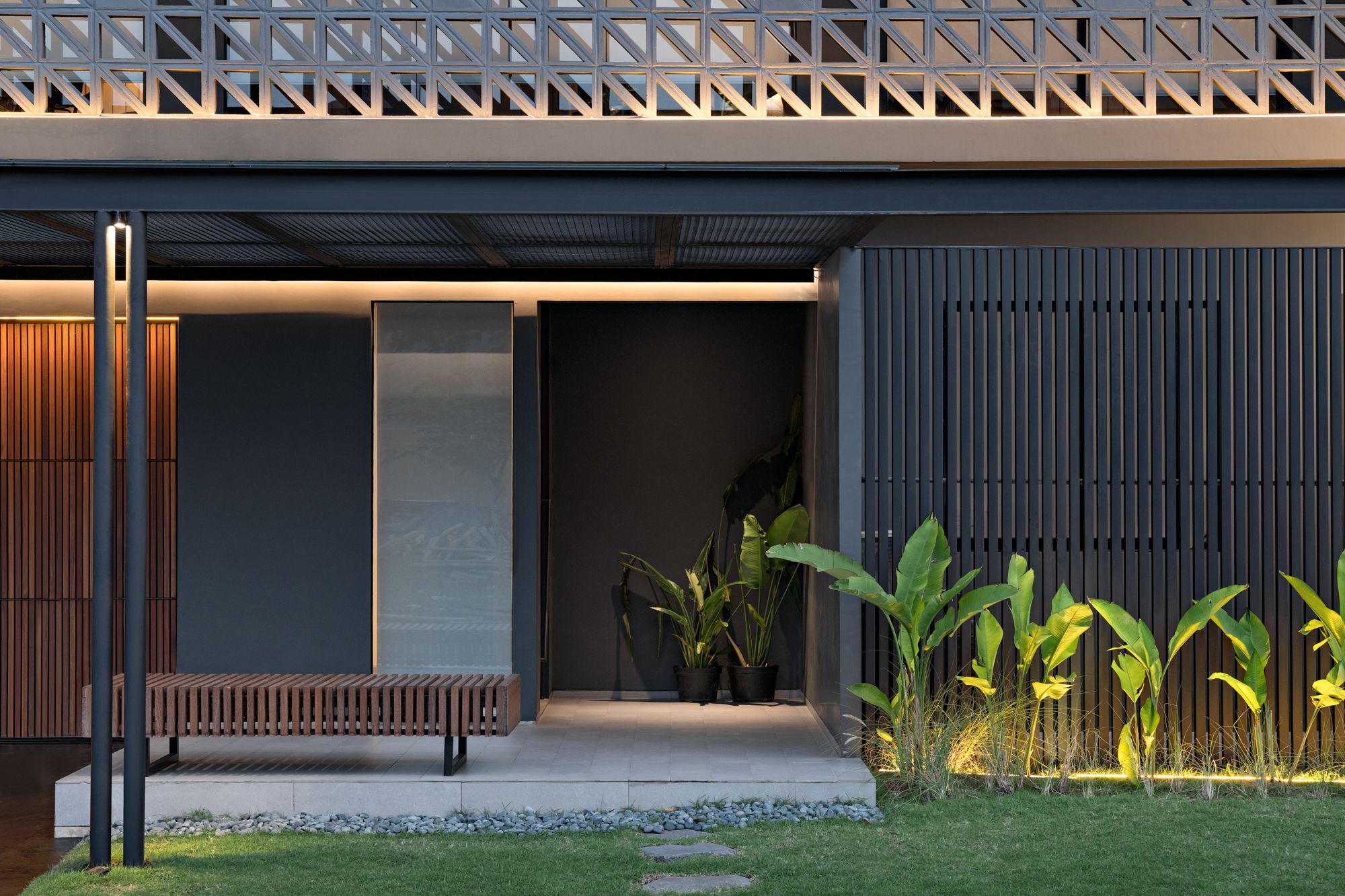 HM House, a Prominent Grey-Structured Three-storey by Axial Studio