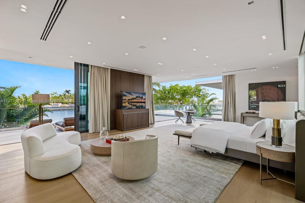 The Miami Beach Home, a tropical modern masterpiece with 110 foot of water frontage designed by Choeff Levy Fischman featuring luxurious amenities for extraordinary Florida waterfront living is now available for sale. This home located at 6480 Allison Rd, Miami Beach, Florida