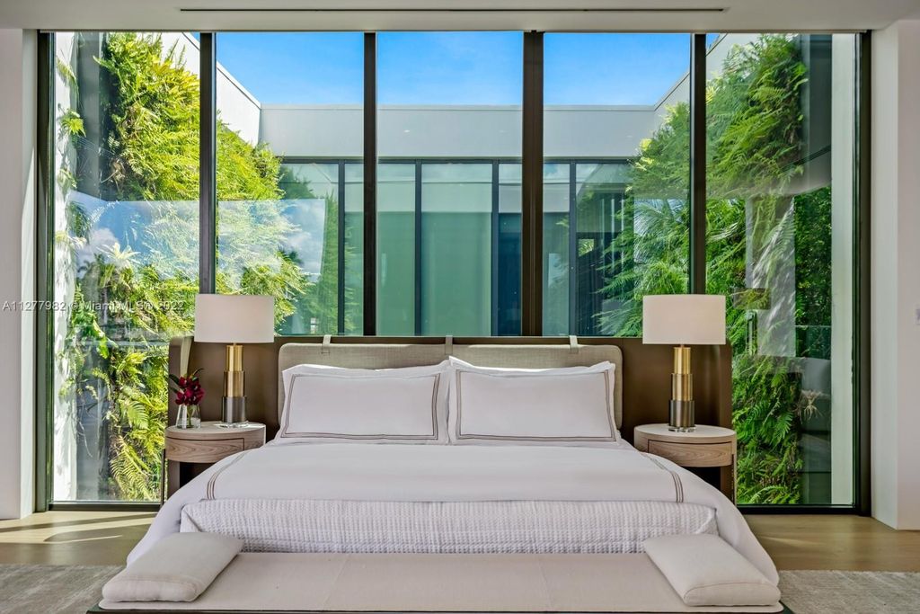 The Miami Beach Home, a tropical modern masterpiece with 110 foot of water frontage designed by Choeff Levy Fischman featuring luxurious amenities for extraordinary Florida waterfront living is now available for sale. This home located at 6480 Allison Rd, Miami Beach, Florida