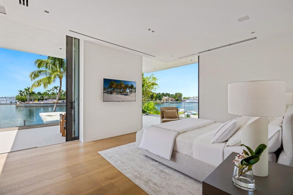 The Miami Beach Home, a tropical modern masterpiece with 110 foot of water frontage designed by Choeff Levy Fischman featuring luxurious amenities for extraordinary Florida waterfront living is now available for sale. This home located at 6480 Allison Rd, Miami Beach, Florida