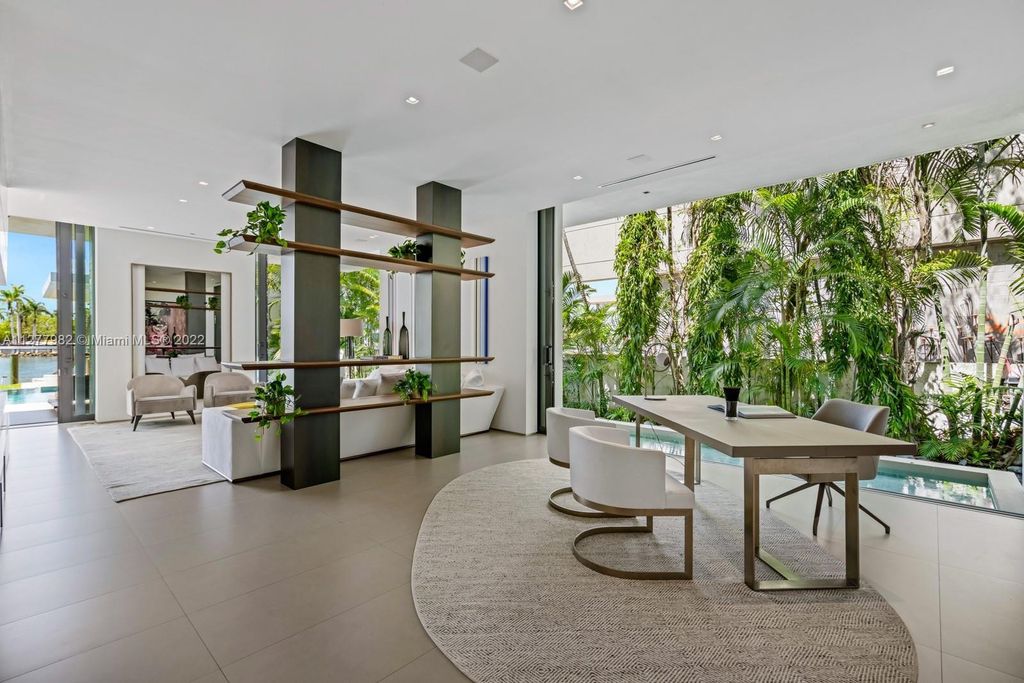 The Miami Beach Home, a tropical modern masterpiece with 110 foot of water frontage designed by Choeff Levy Fischman featuring luxurious amenities for extraordinary Florida waterfront living is now available for sale. This home located at 6480 Allison Rd, Miami Beach, Florida