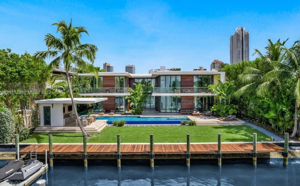 The Miami Beach Home, a tropical modern masterpiece with 110 foot of water frontage designed by Choeff Levy Fischman featuring luxurious amenities for extraordinary Florida waterfront living is now available for sale. This home located at 6480 Allison Rd, Miami Beach, Florida