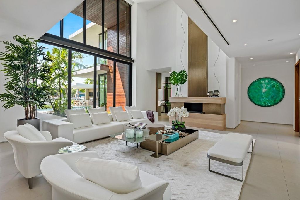 The Miami Beach Home, a tropical modern masterpiece with 110 foot of water frontage designed by Choeff Levy Fischman featuring luxurious amenities for extraordinary Florida waterfront living is now available for sale. This home located at 6480 Allison Rd, Miami Beach, Florida