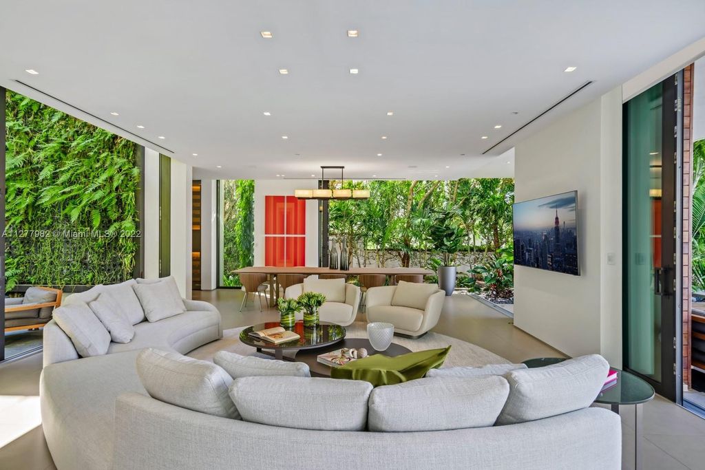 The Miami Beach Home, a tropical modern masterpiece with 110 foot of water frontage designed by Choeff Levy Fischman featuring luxurious amenities for extraordinary Florida waterfront living is now available for sale. This home located at 6480 Allison Rd, Miami Beach, Florida