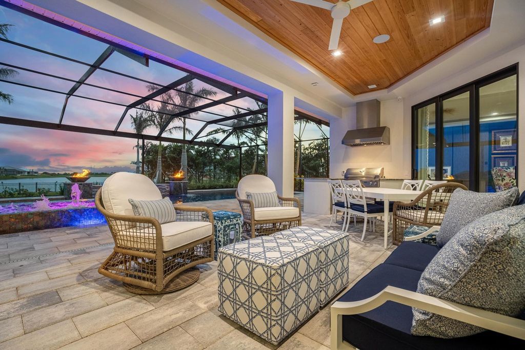 The Home in Rockledge, a lavish lakefront estate has a spacious family room, a fountain saltwater pool, spa, a gorgeous quartz island kitchen, an outdoor kitchen is now available for sale. This home located at 4574 Milost Dr, Rockledge, Florida