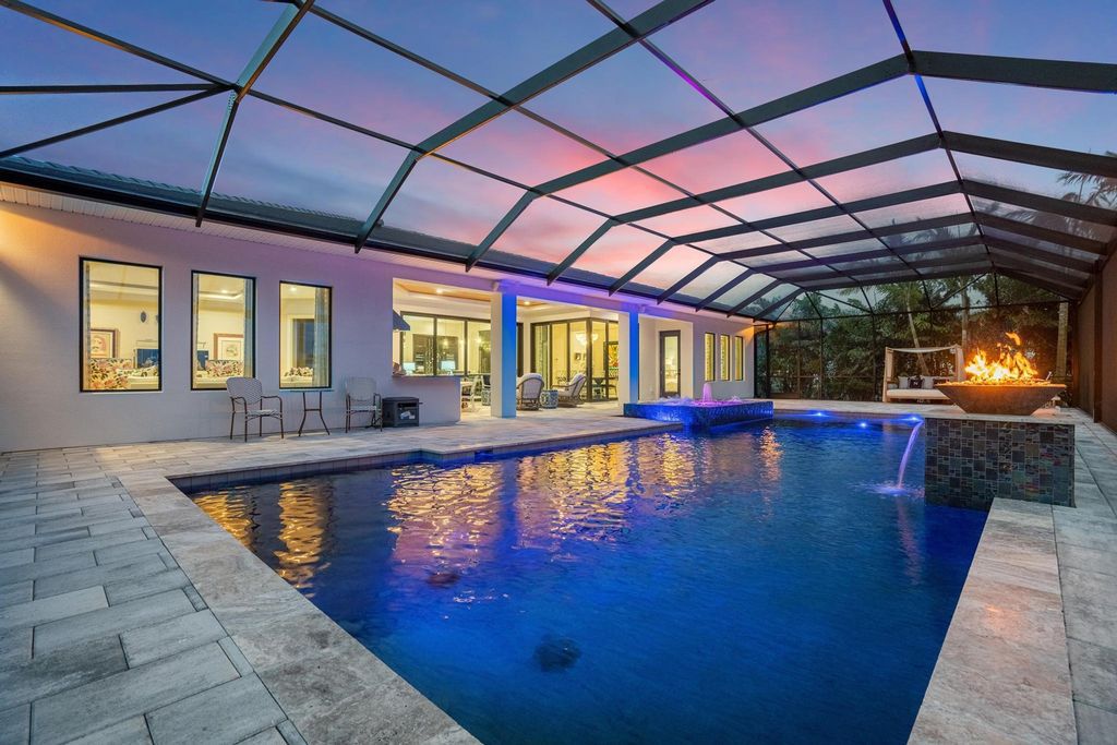 The Home in Rockledge, a lavish lakefront estate has a spacious family room, a fountain saltwater pool, spa, a gorgeous quartz island kitchen, an outdoor kitchen is now available for sale. This home located at 4574 Milost Dr, Rockledge, Florida