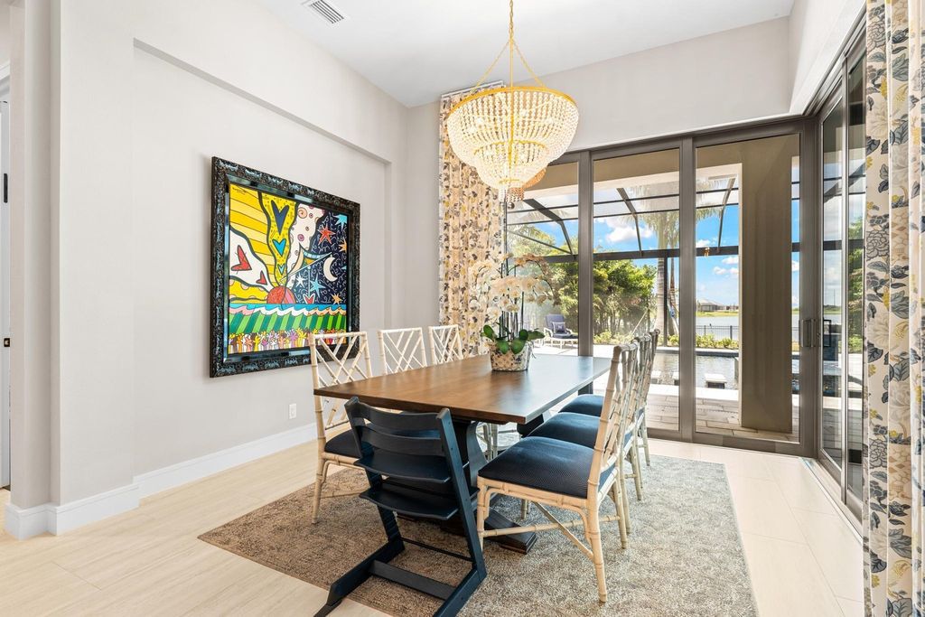 The Home in Rockledge, a lavish lakefront estate has a spacious family room, a fountain saltwater pool, spa, a gorgeous quartz island kitchen, an outdoor kitchen is now available for sale. This home located at 4574 Milost Dr, Rockledge, Florida