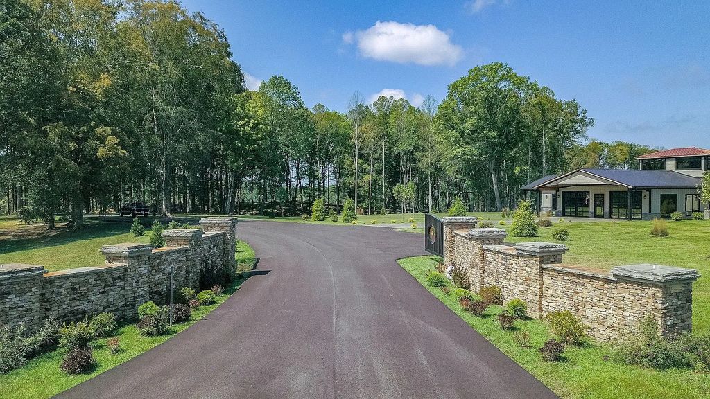 The Estate in Byrdstown is a magnificent lake view home with dramatic 2 story resort-style, now available for sale. This home located at 5156 Turney Groce Rd, Byrdstown, Tennessee
