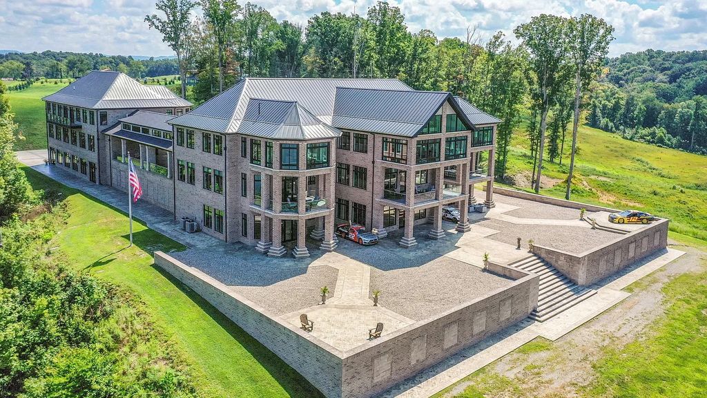 The Estate in Byrdstown is a magnificent lake view home with dramatic 2 story resort-style, now available for sale. This home located at 5156 Turney Groce Rd, Byrdstown, Tennessee